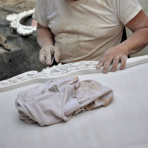 closeup-wood-artisan-carving-decorative-design-wooden-furniture-his-workshop
